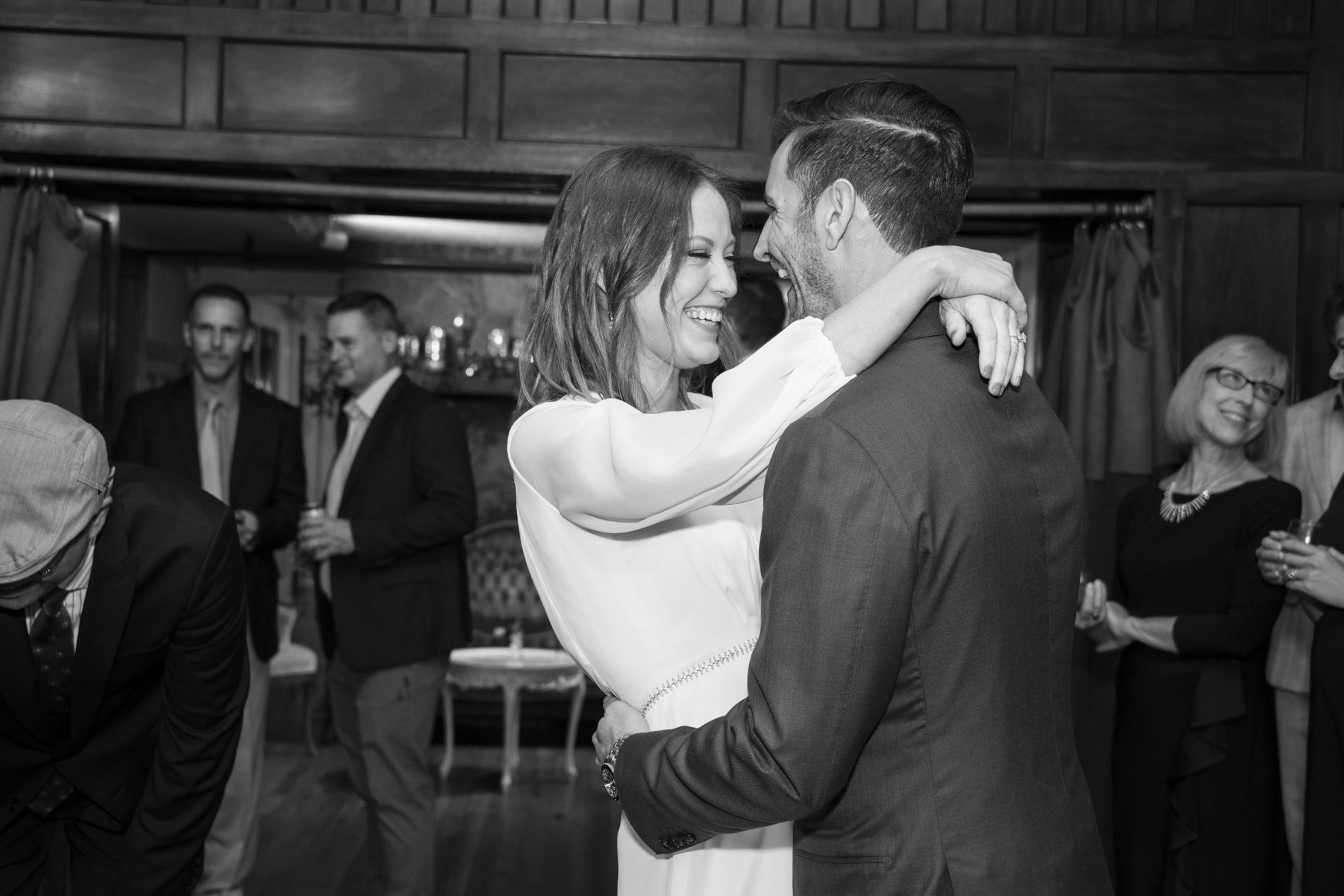 Couple laughing during first dance at Homewood in Asheville NC