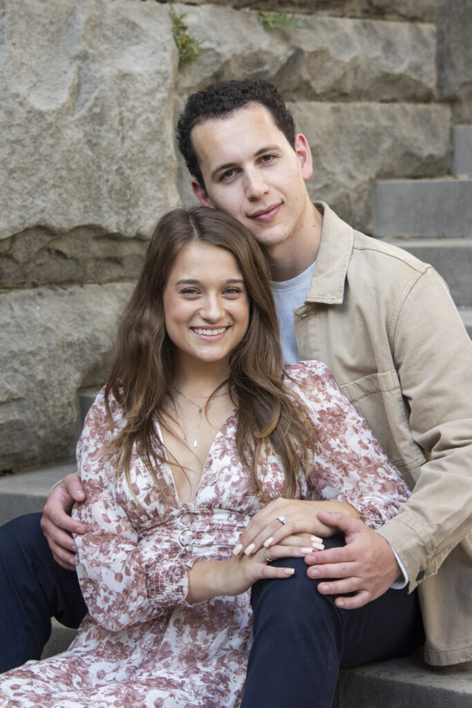 Couple smiling at camera during portrait