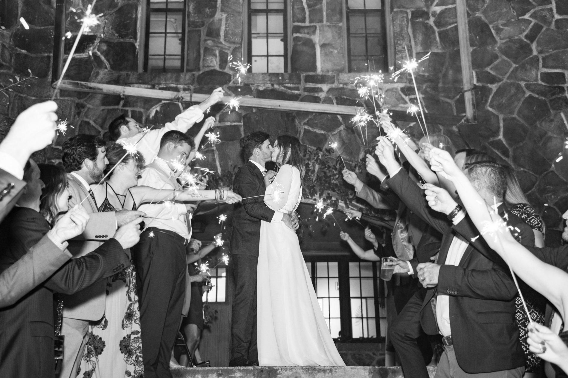 Couple kissing during sparkler exit at Homewood Wedding Photography