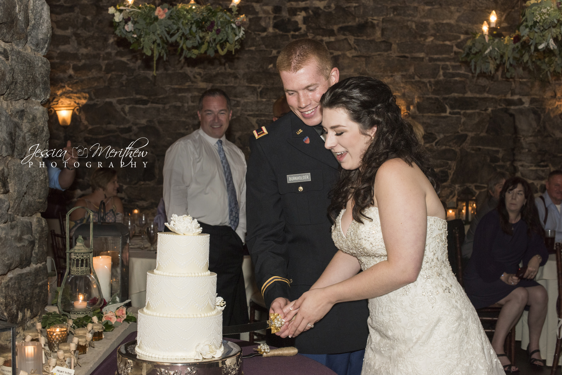 Couple cutting cake during Biltmore Estate wedding photography