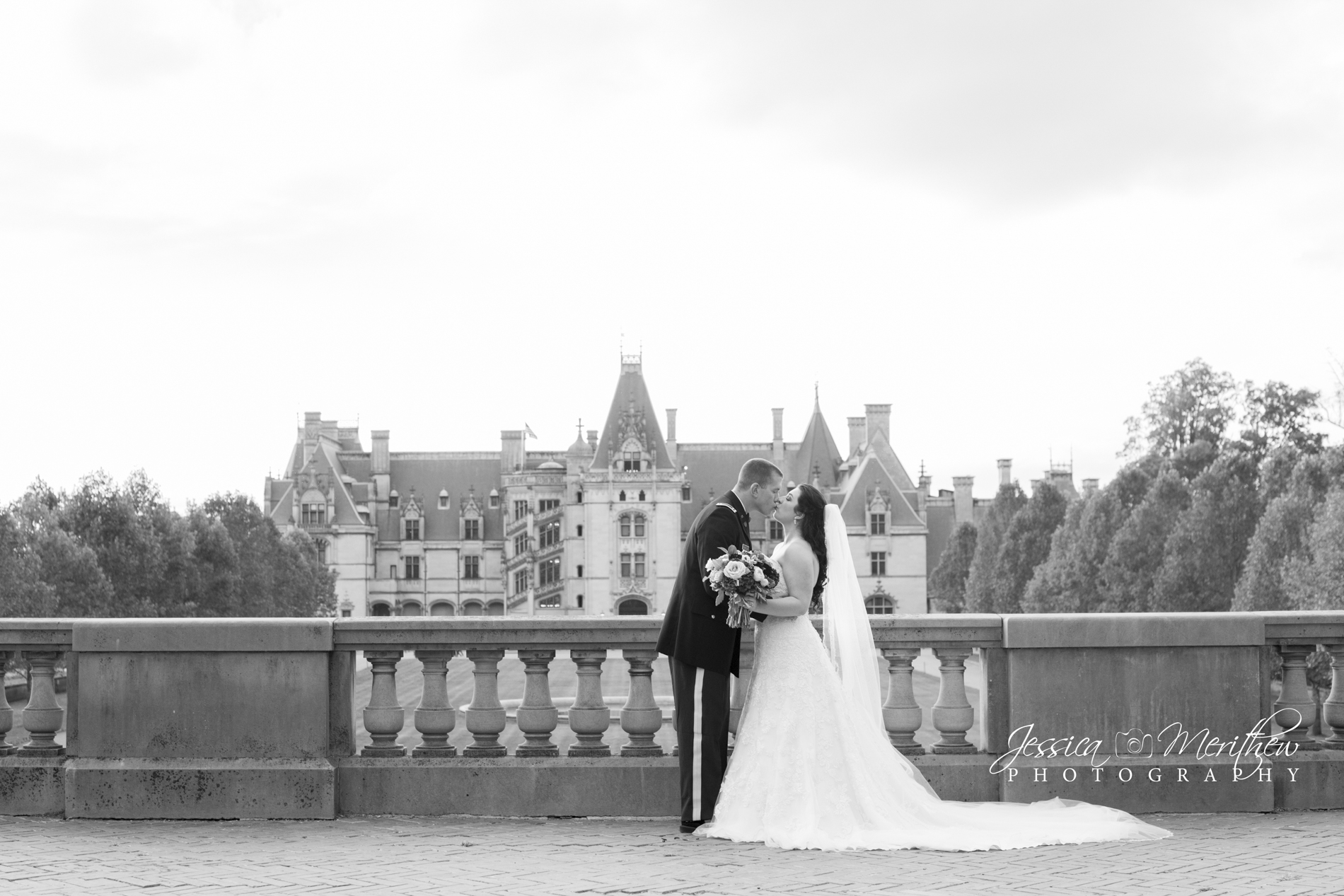 Couple kissing at Biltmore Estate wedding photography