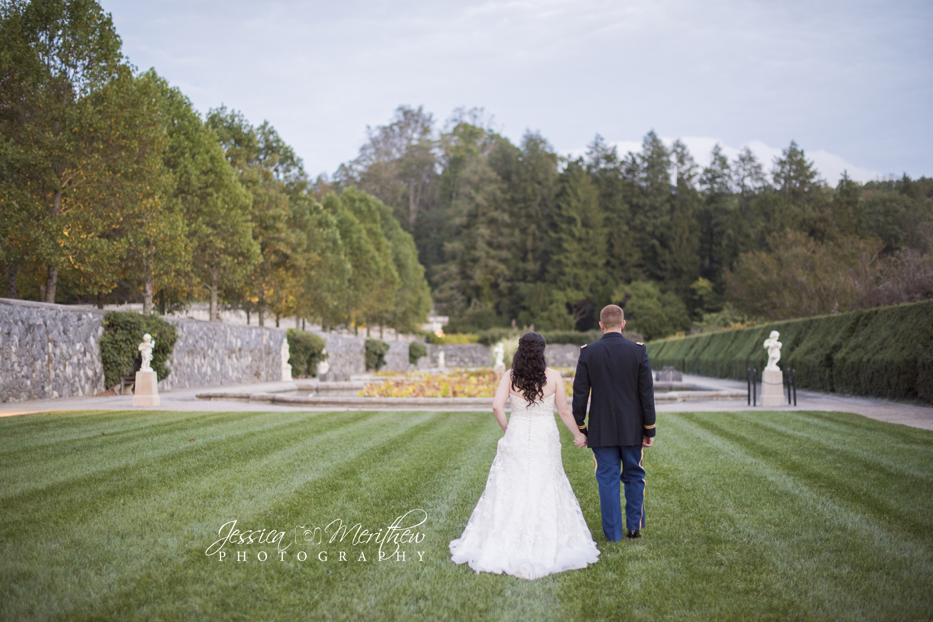 Couple walking through Italian garden at Biltmore Estate