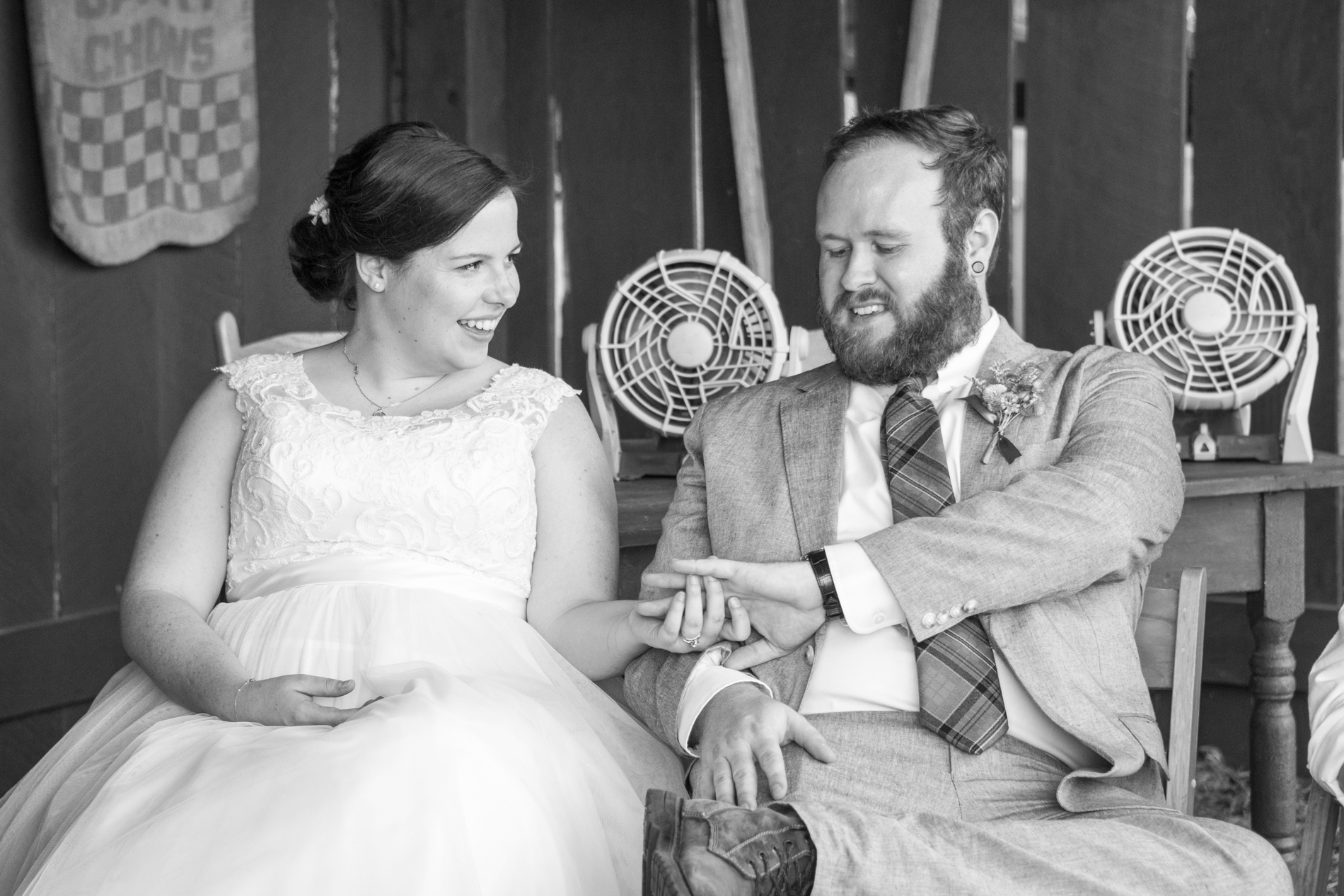 Couple looking at rings after ceremony at Yesterday Spaces Asheville