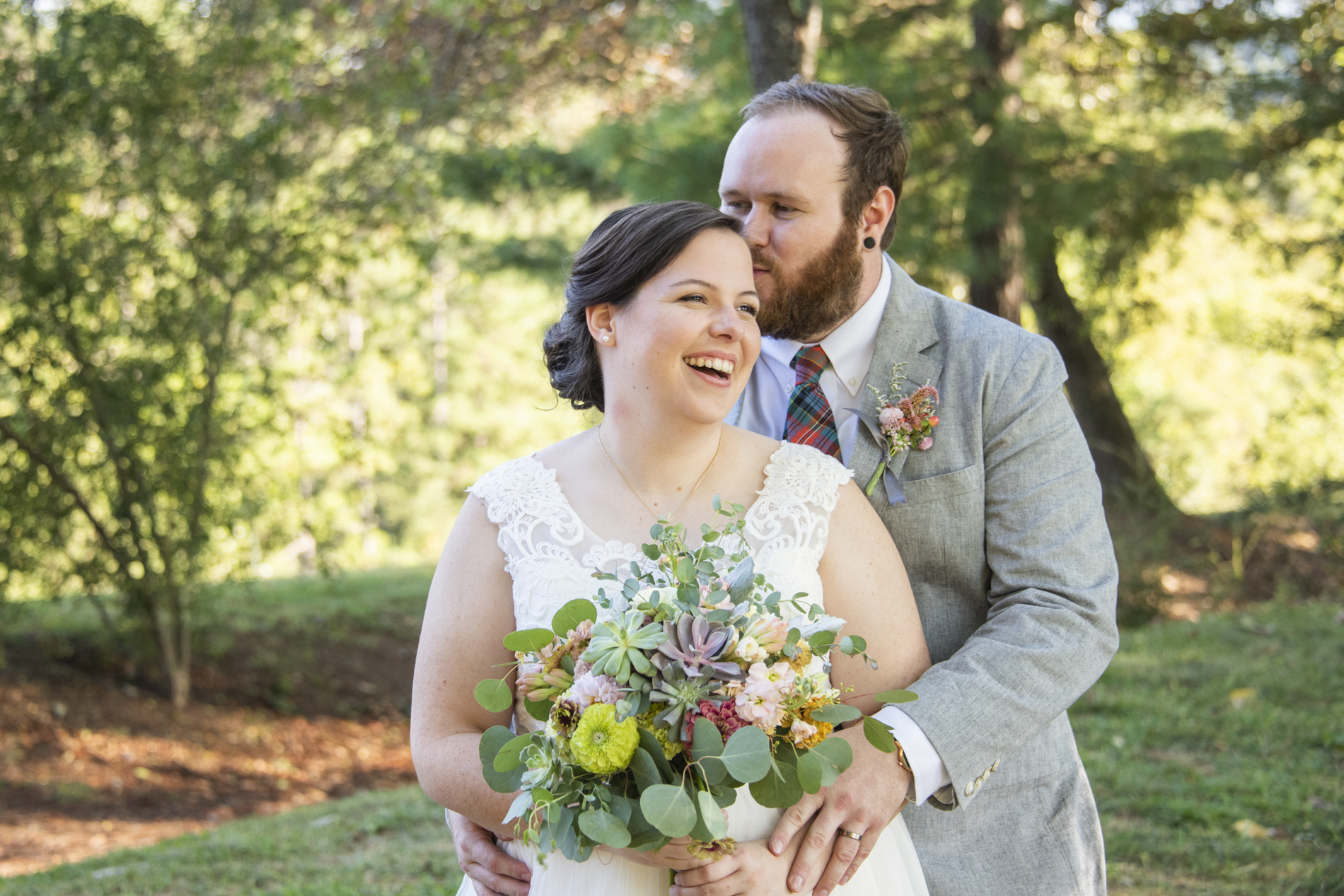 Couple laughing at wedding at Yesterday Spaces Asheville