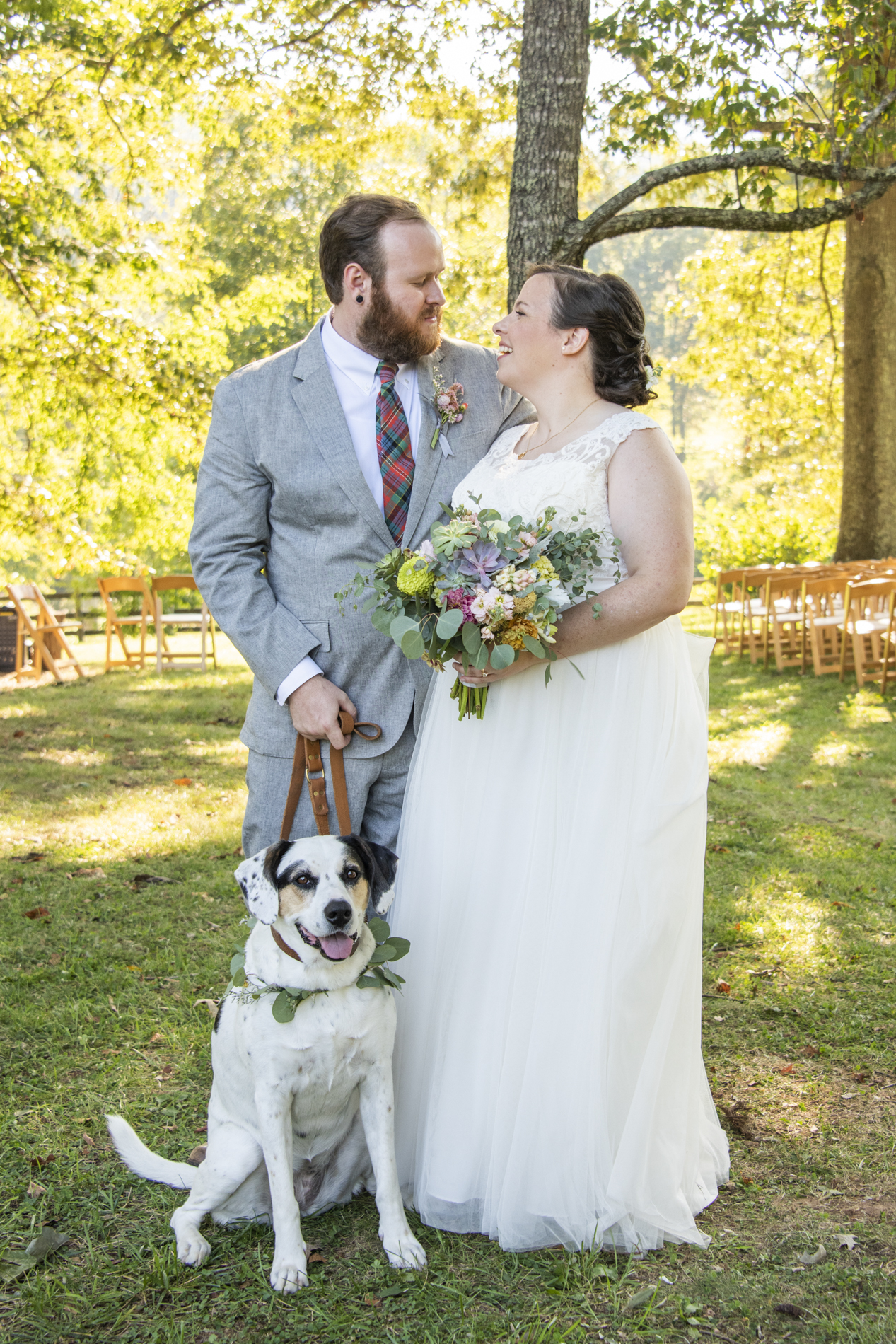 Couples wedding portrait with dog