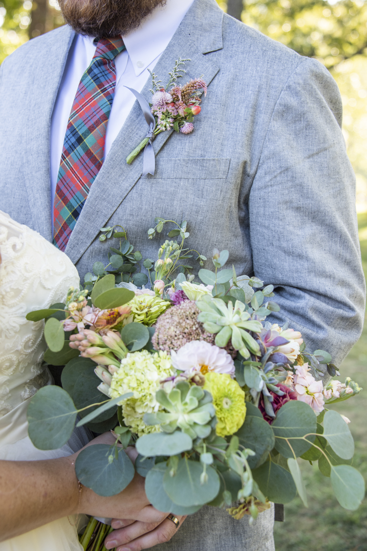 Yesterday Spaces Asheville wedding bouquet with succulents and wildflowers