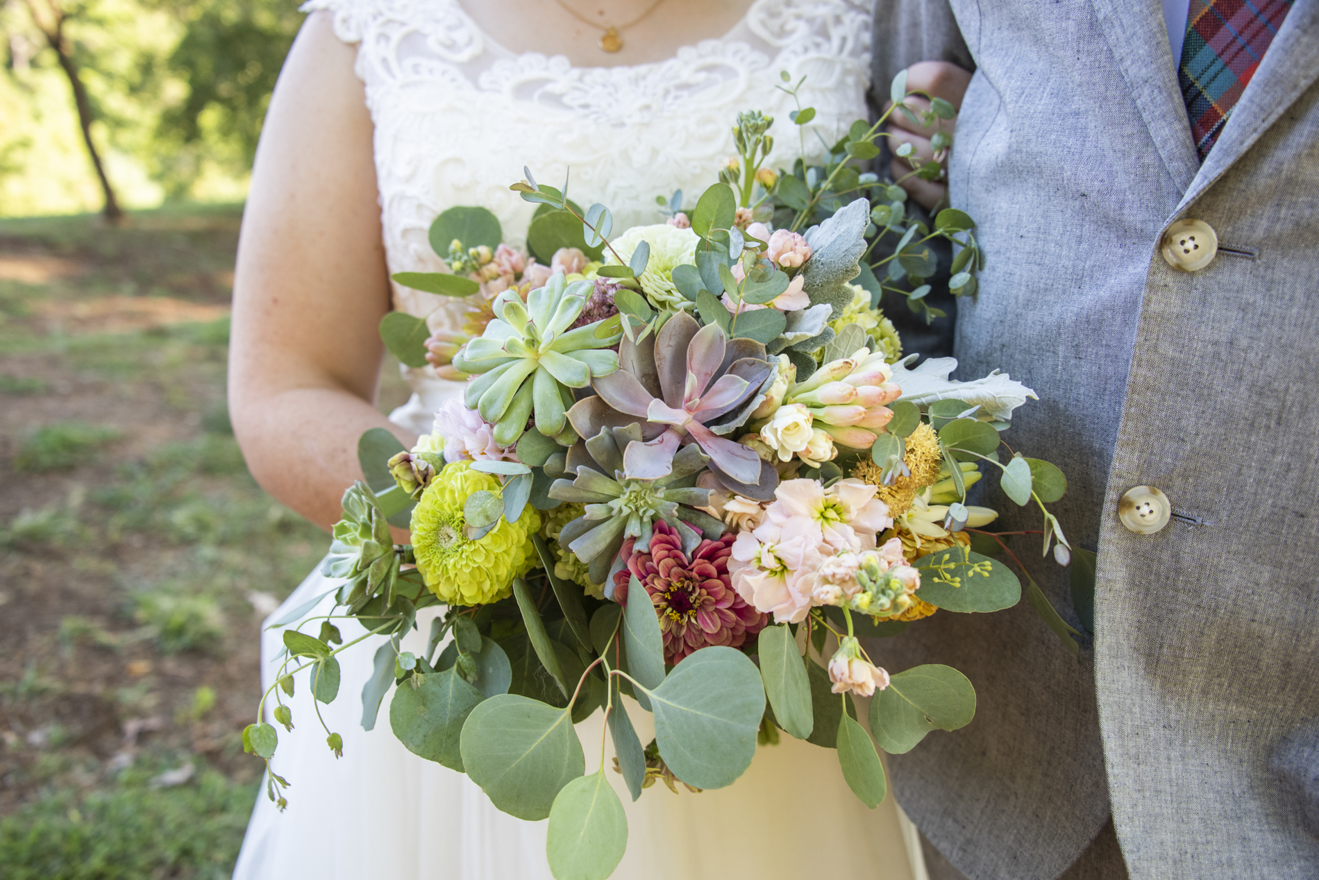 Bridal bouquet of wildflowers and succulents