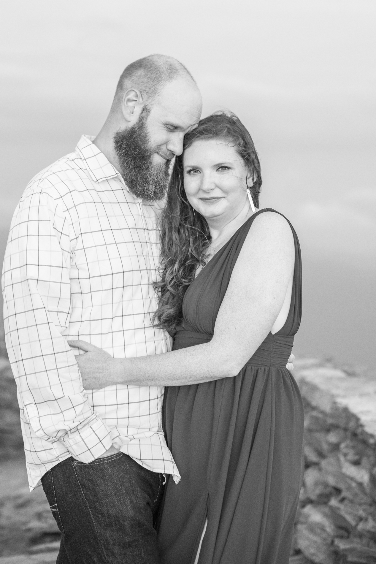 Couple snugging during Craggy Gardens Engagement Photos