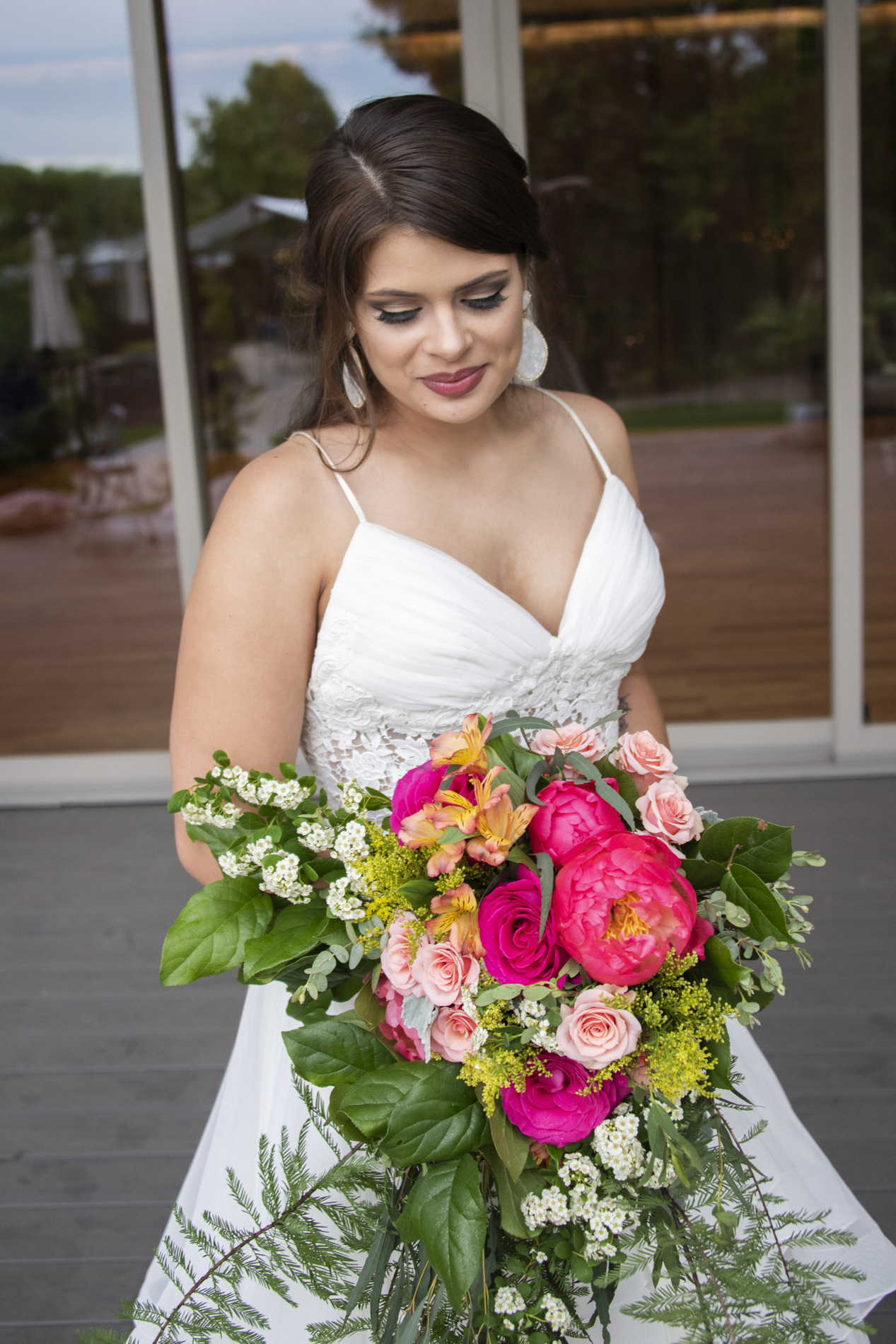 Bride holding colorful wedding bouquet