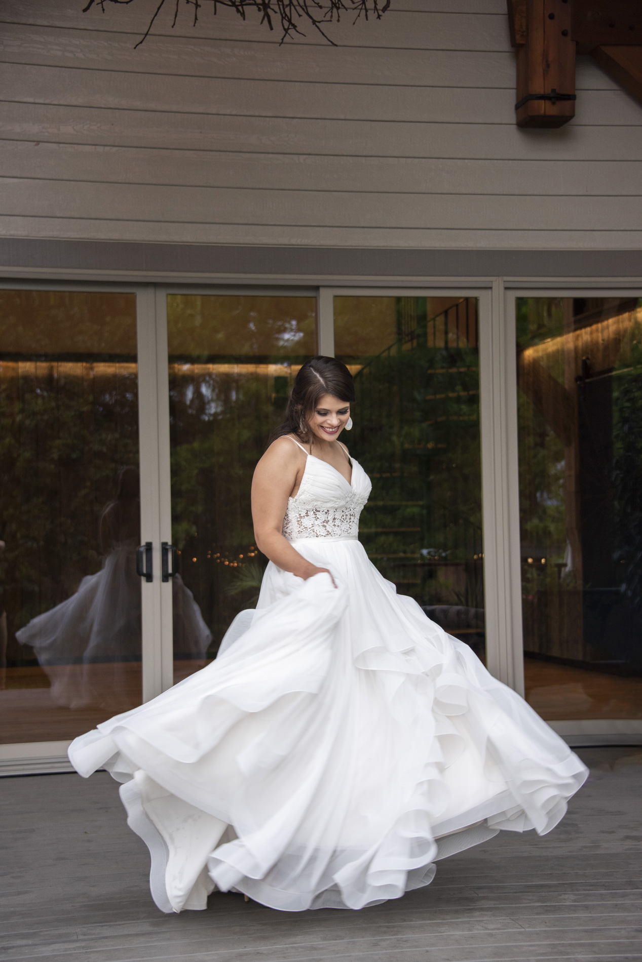 Bride spinning in dress at Haiku wedding