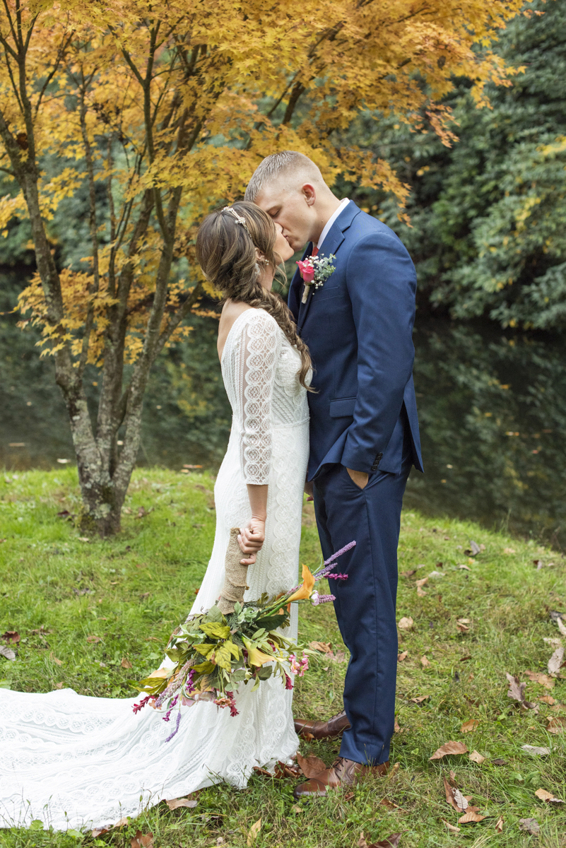 Couple kissing during fall, Hendersonville NC Photographer