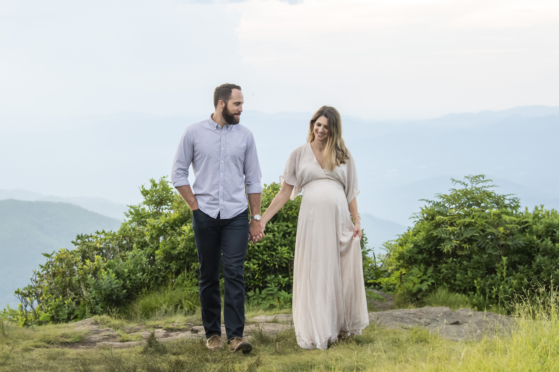 Couple walking together during Maternity Photography in Asheville