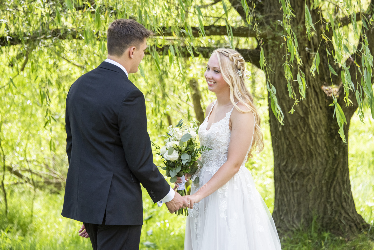 Couple during first look at wedding