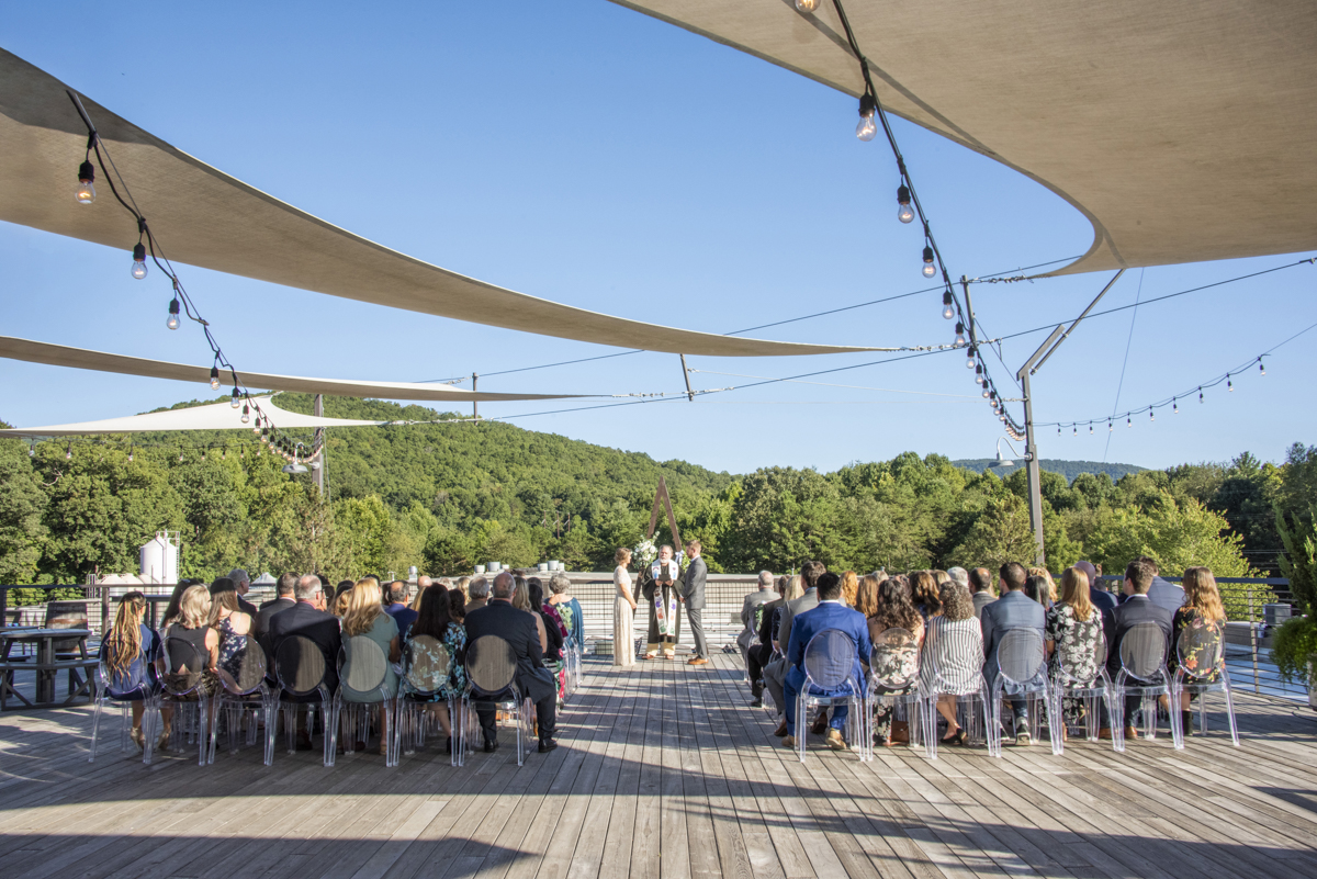 Wedding ceremony on rooftop at Highland Brewing Wedding