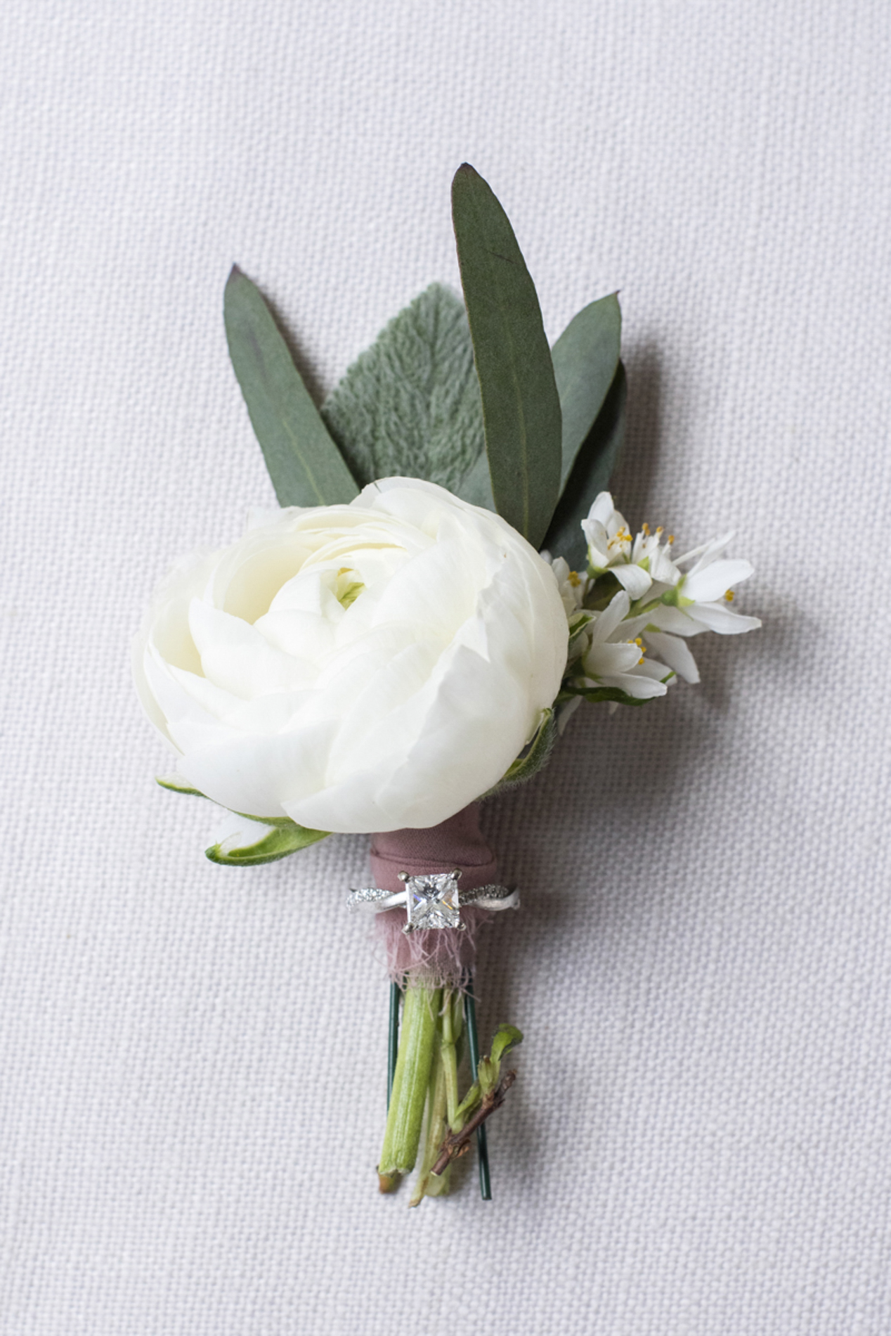 Wedding boutonniere with ring