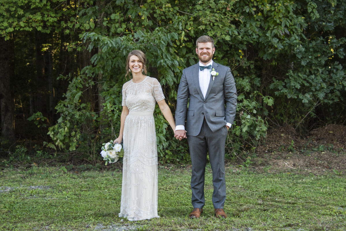 Couple holding hands and smiling