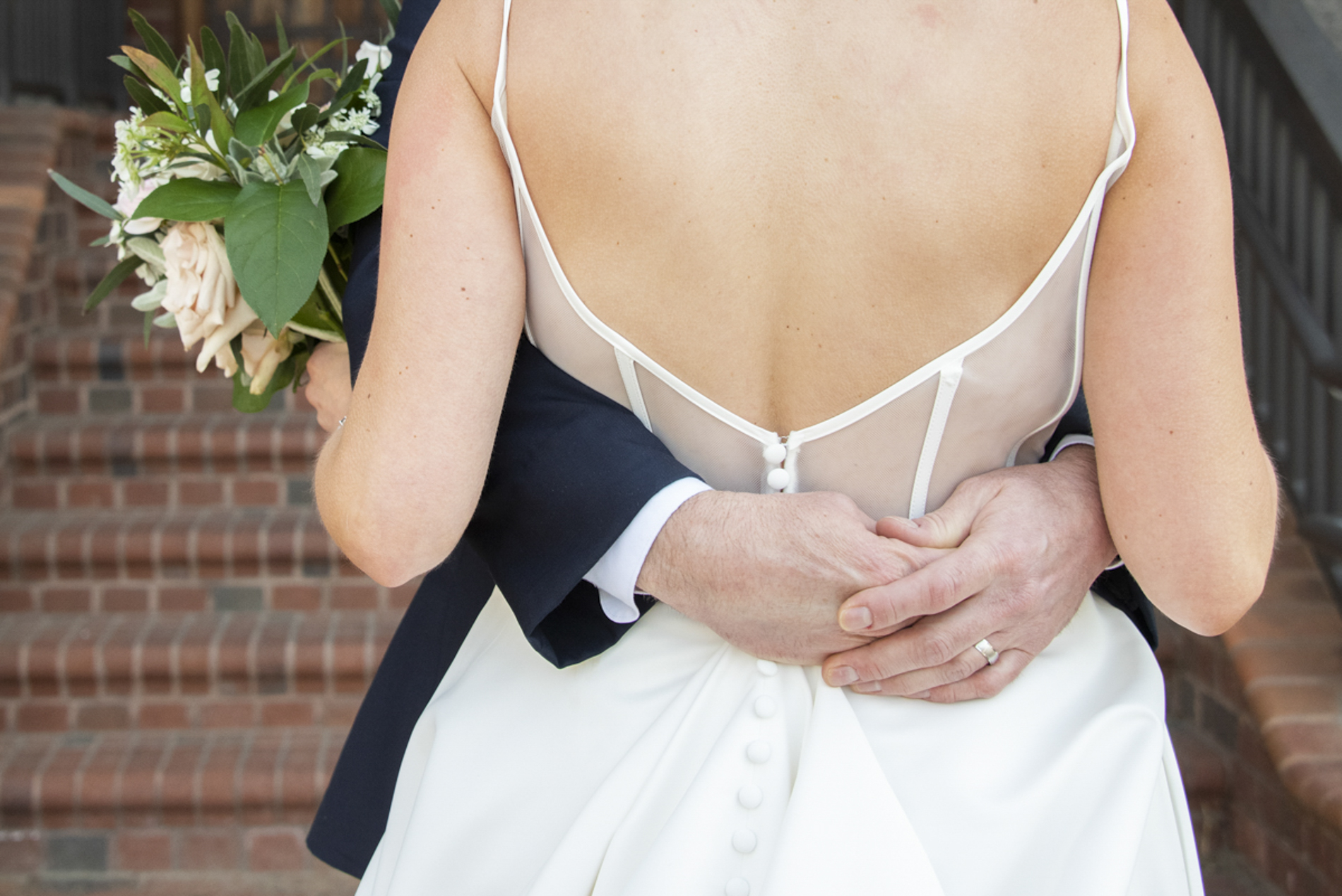 Groom holding bride at Grand Bohemian Asheville Wedding