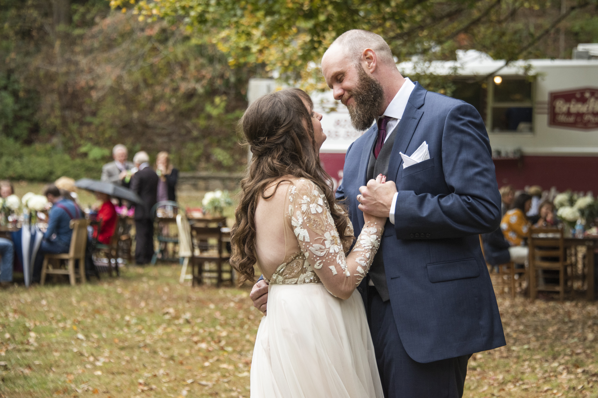 Couple dancing at Asheville botanical gardens wedding