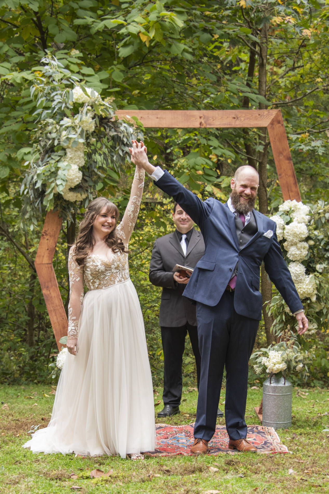 Couple celebrating at Asheville botanical gardens wedding