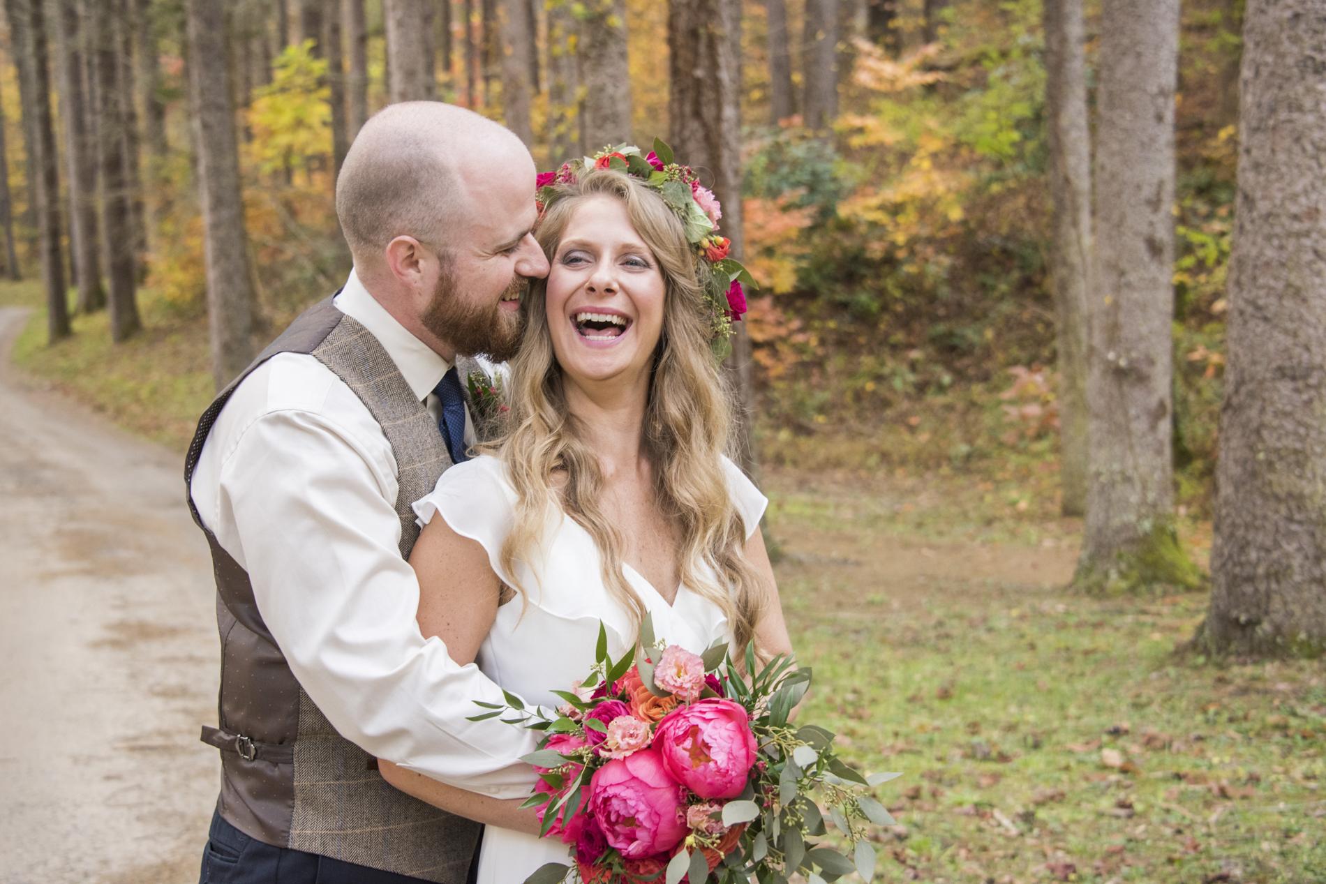 Lake Logan Wedding couple laughing