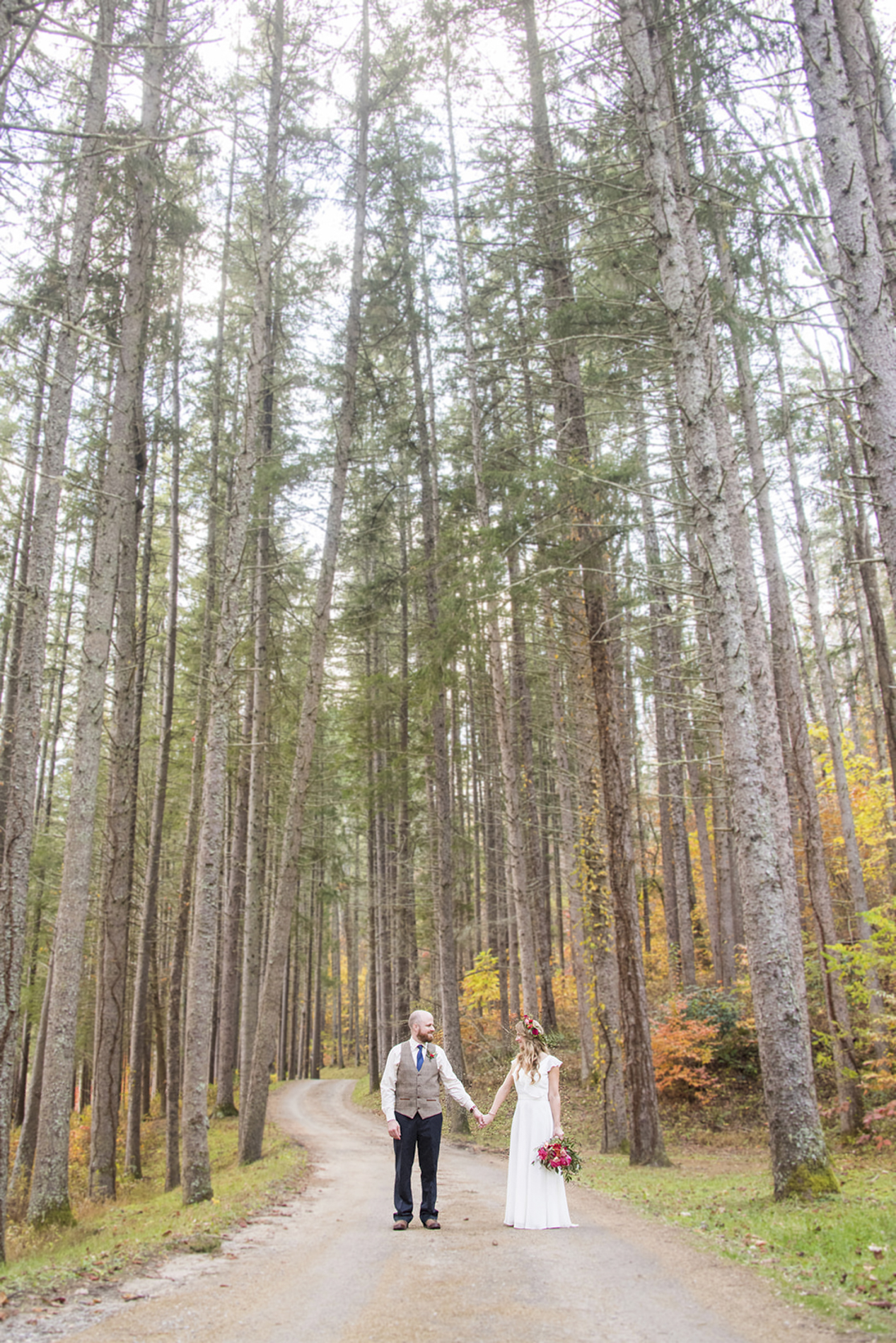 Couple in forest at Lake Logan Wedding