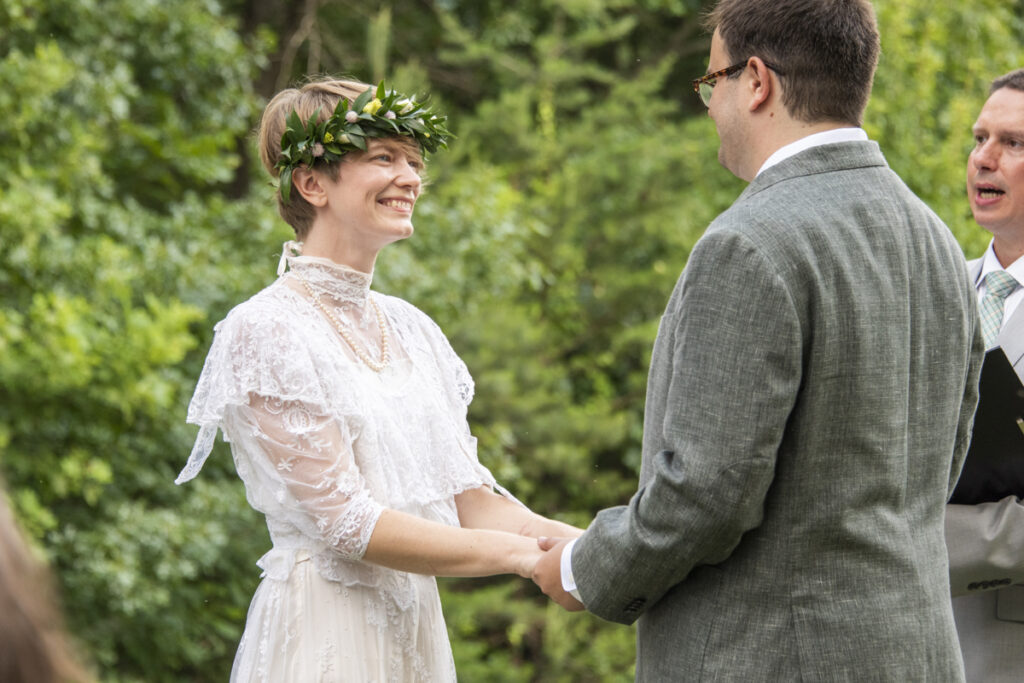 Couple smiling during ceremony