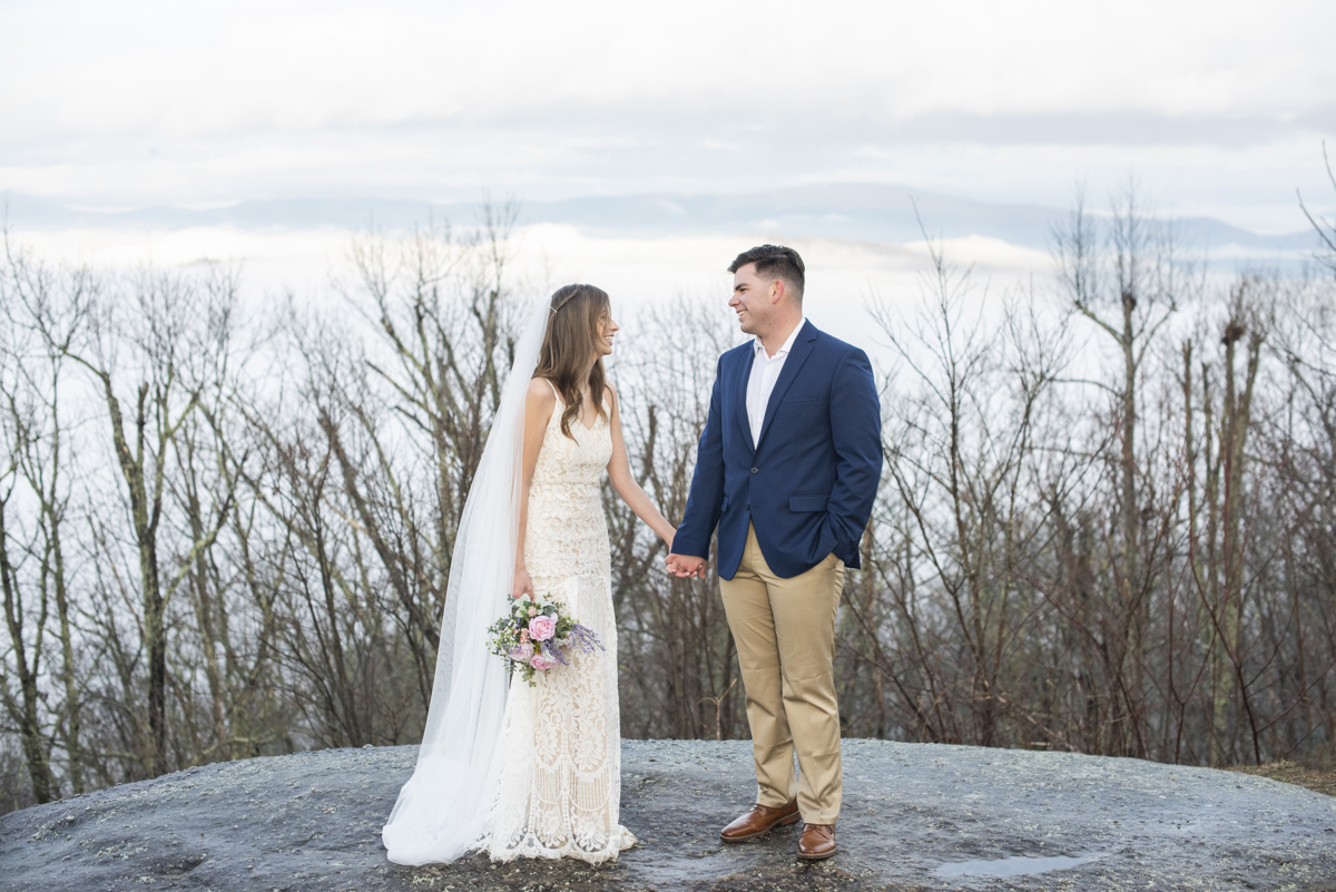 Couple laughing during Jump Off Rock Wedding