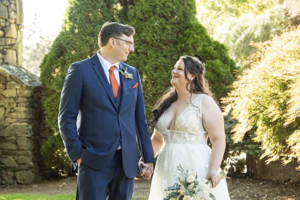 Wedding couple holding hands at Omni Grove Park Inn Wedding