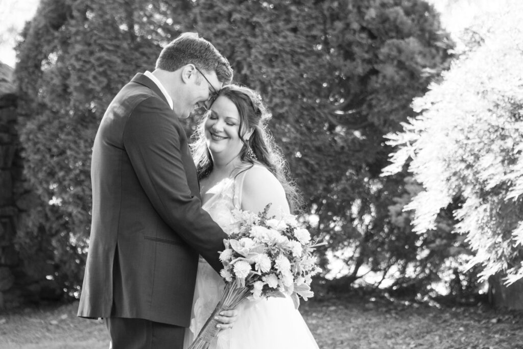 Couple snuggling at Omni Grove Park Inn Wedding