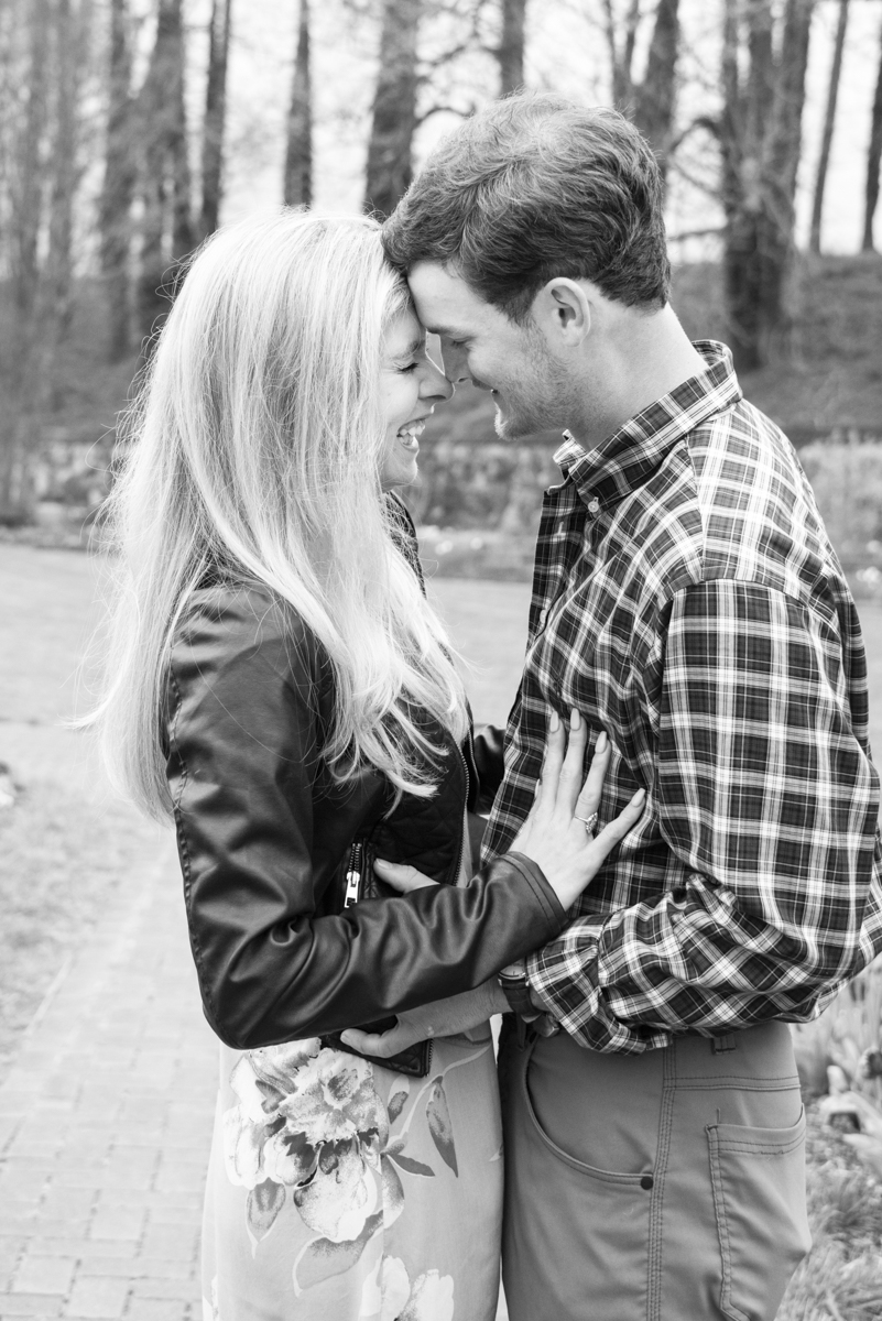Couple snuggling during Biltmore Estate Proposal photos