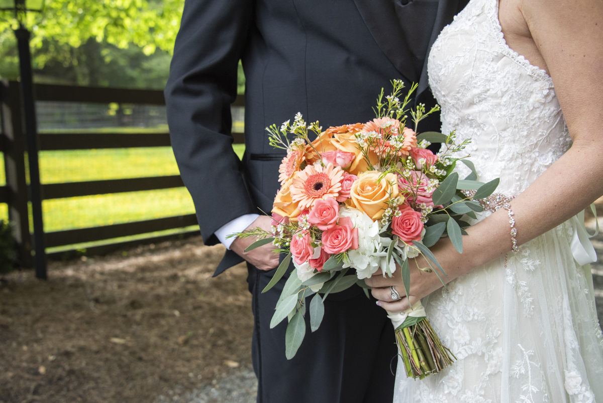 Couple with wedding bouquet