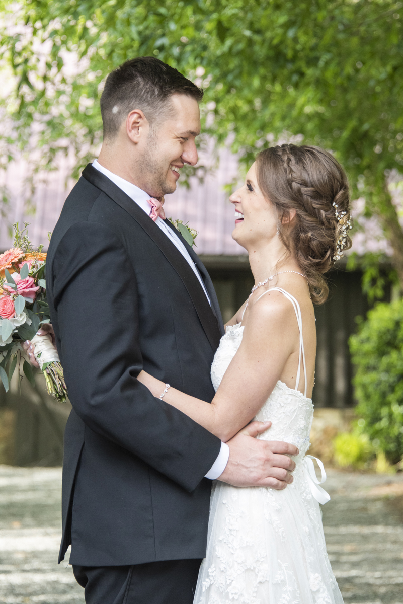 Couple laughing at Hawkesdene Wedding