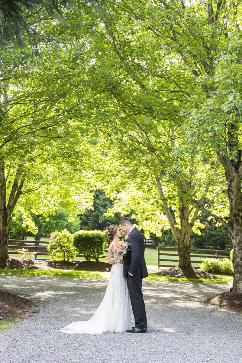 Couple snuggling at Hawkesdene Wedding