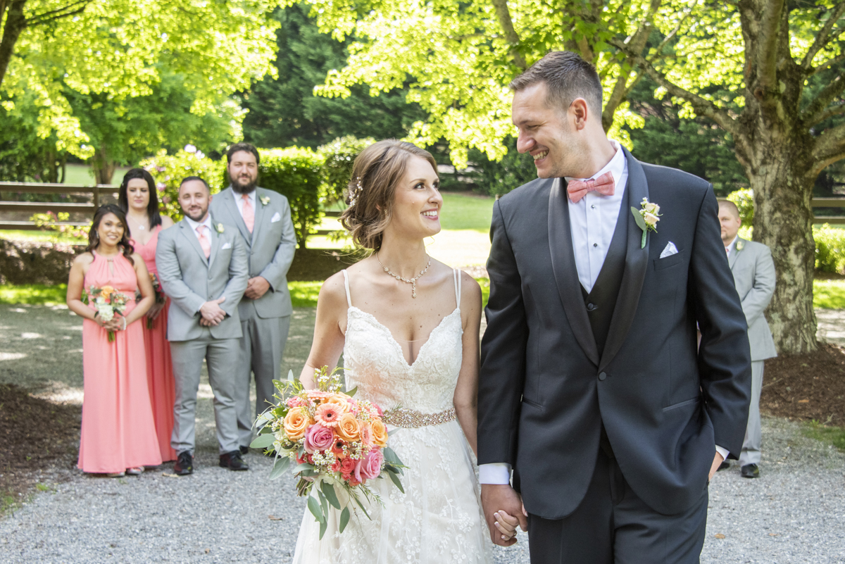 Couple walking at Hawkesdene Wedding