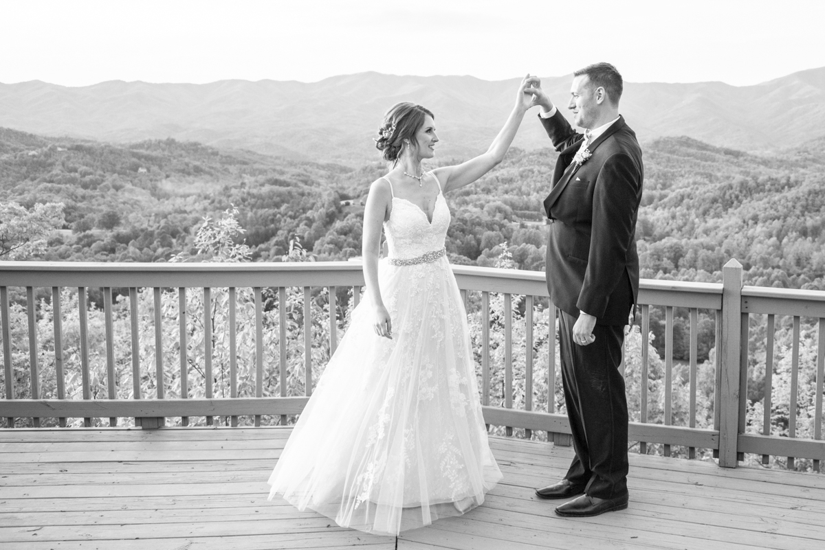 Couple dancing on mountain top at Hawkesdene Wedding