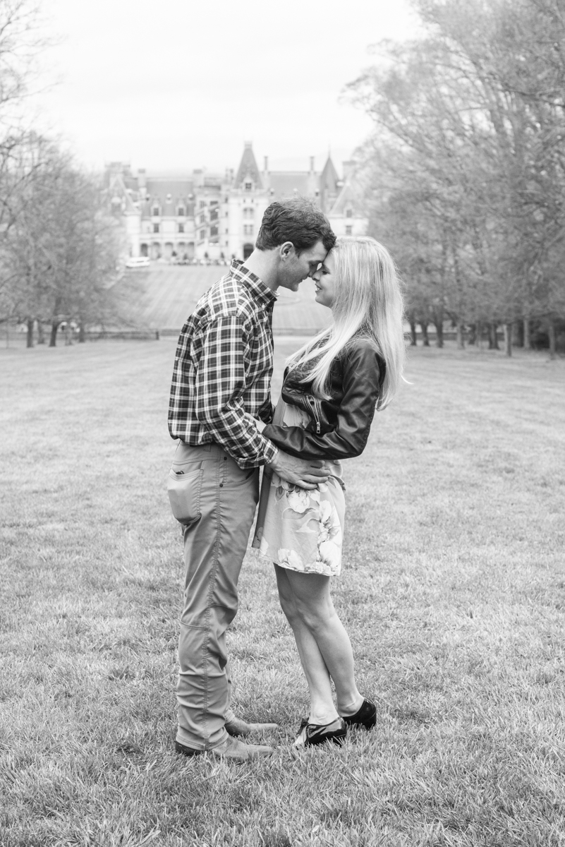 Couple snuggling during Biltmore Estate Proposal photos