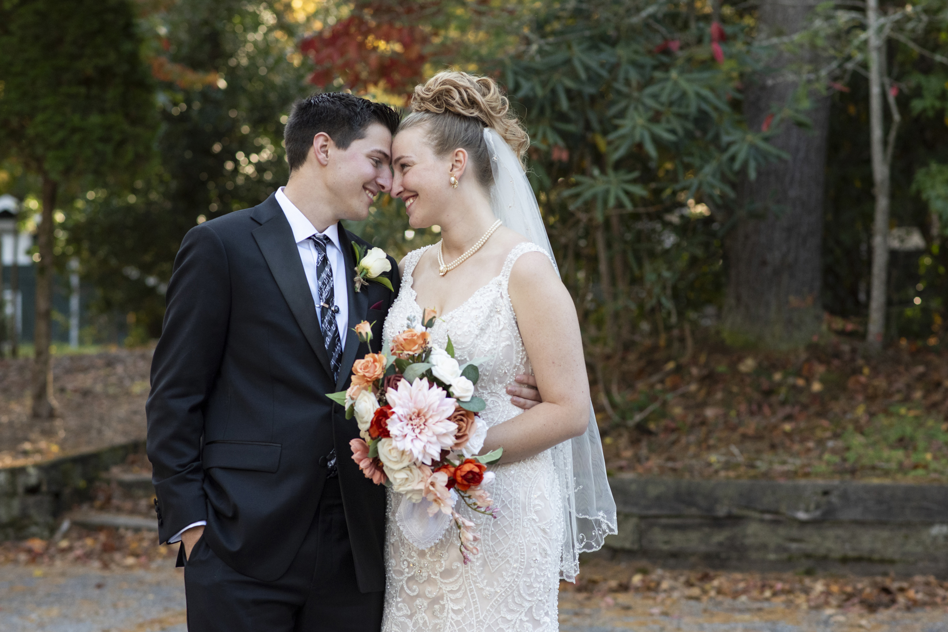 Couple snuggling at Kanuga Wedding