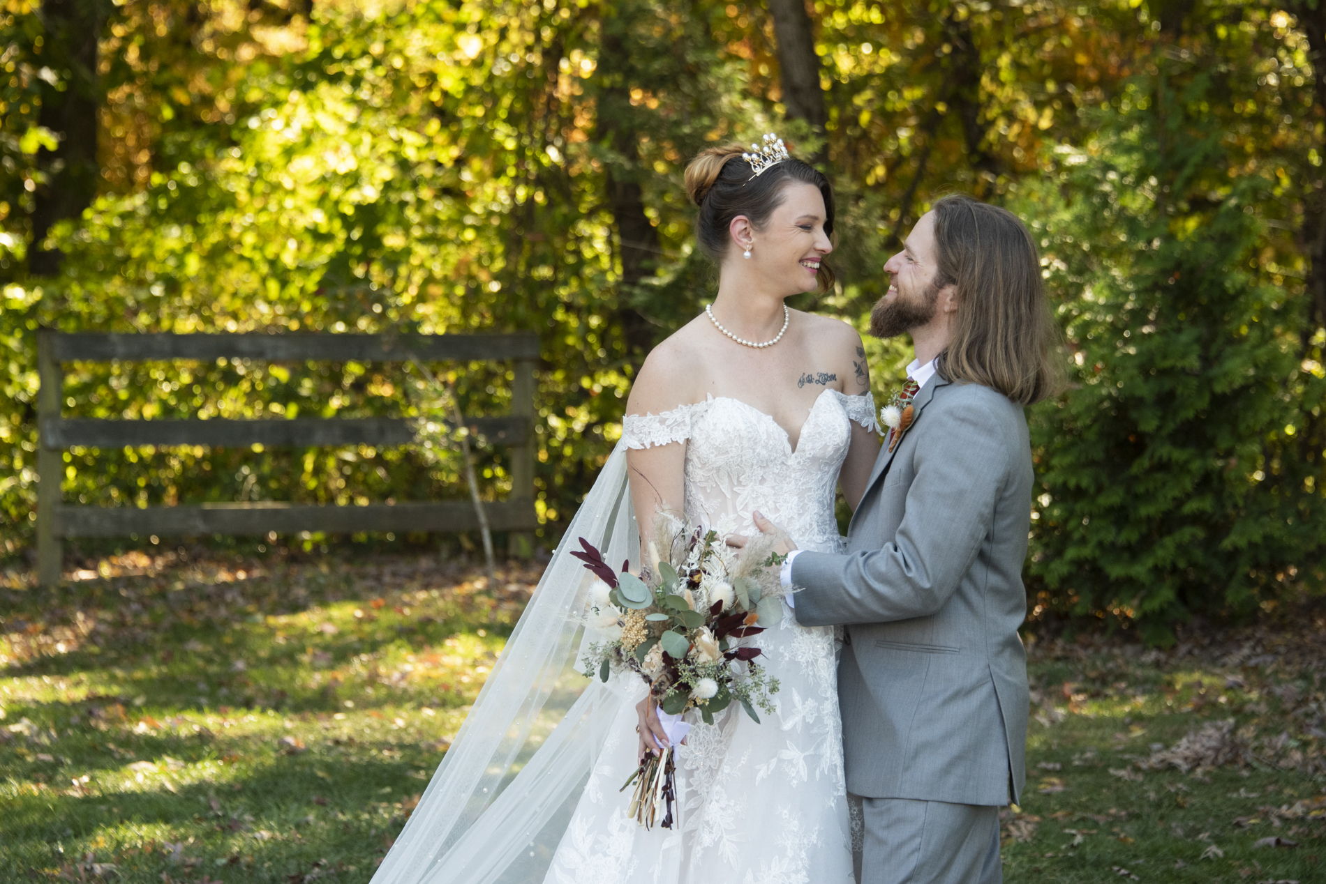 Couple smiling at The Farm Wedding Venue