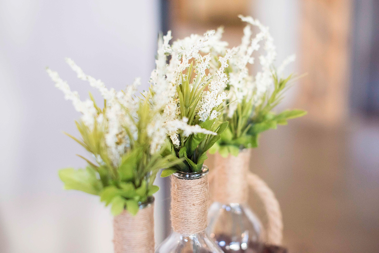 white flowers in vases
