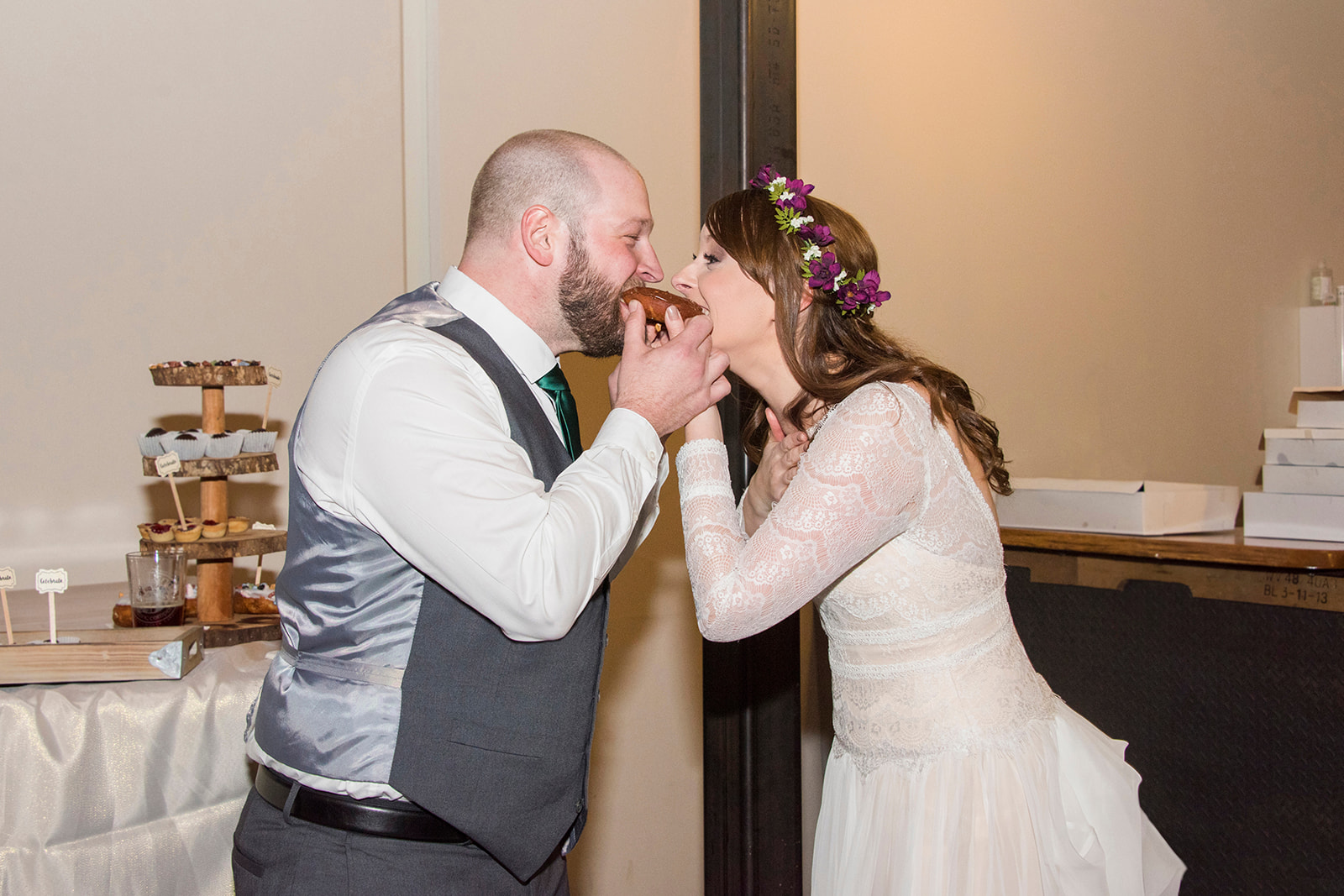 Couple sharing donut