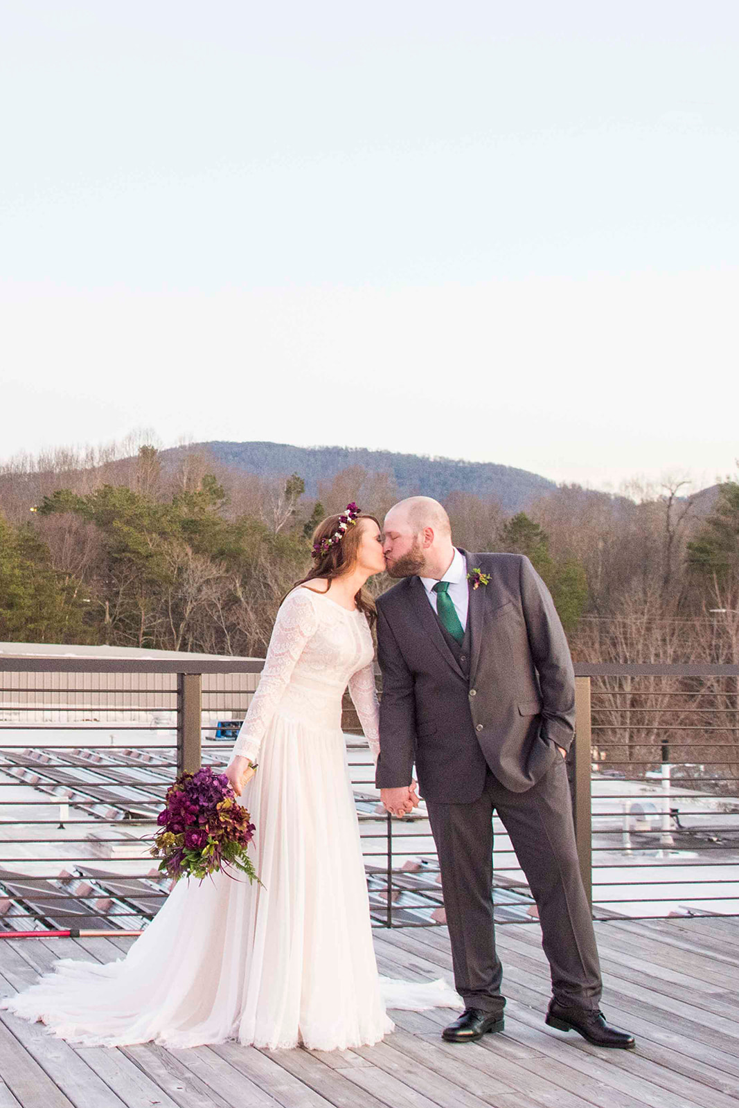 Couple kissing at Highland Brewery Wedding