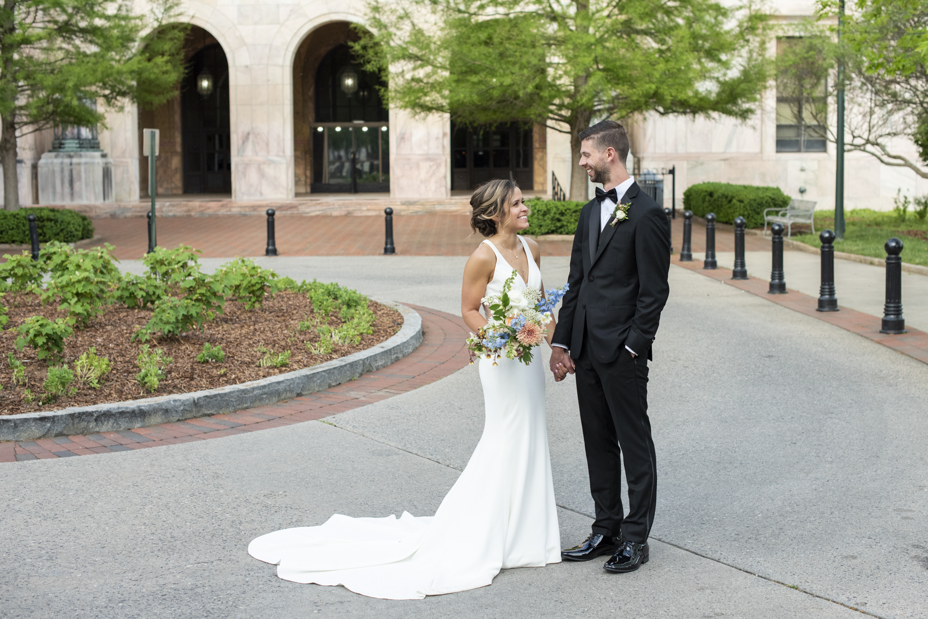 Couple holding hands at Century Room on the Park