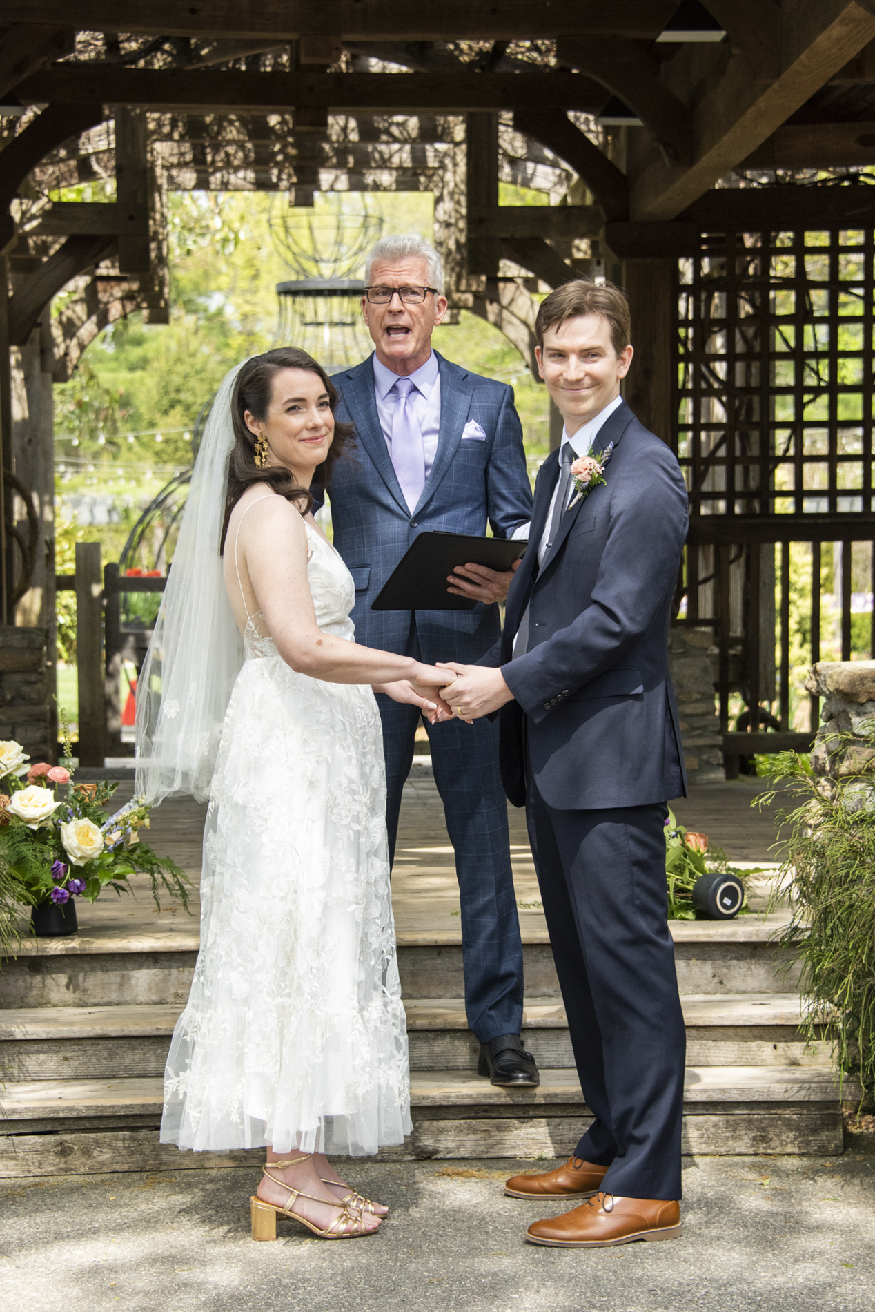 Couple looking at guests at NC Arboretum weddings