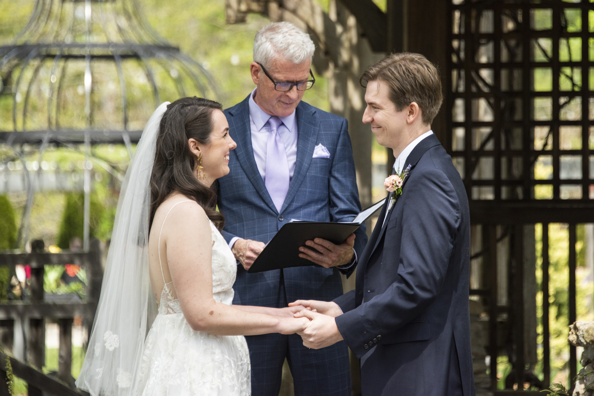 Couple smiling during wedding ceremony