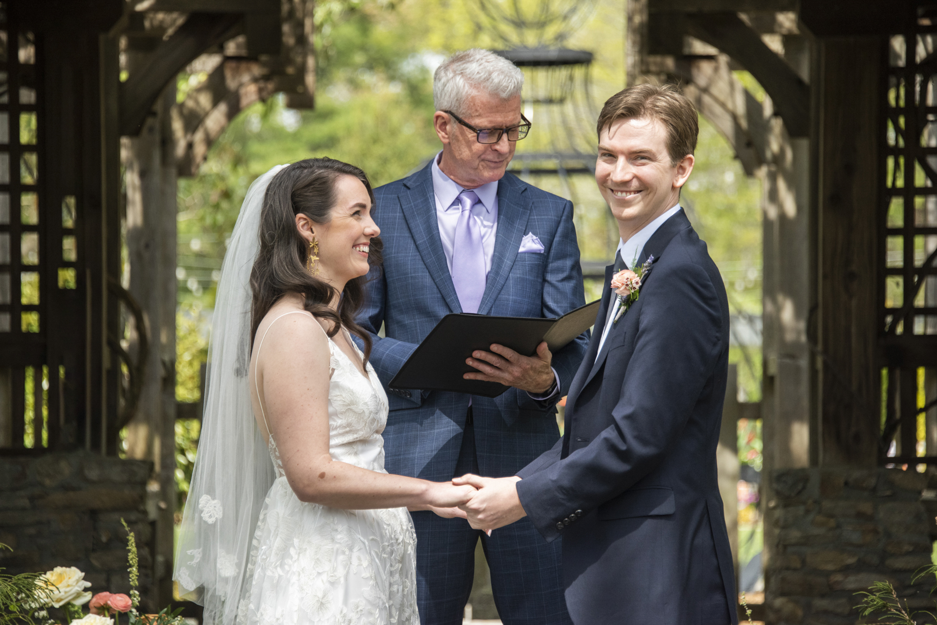 Groom smiling at wedding