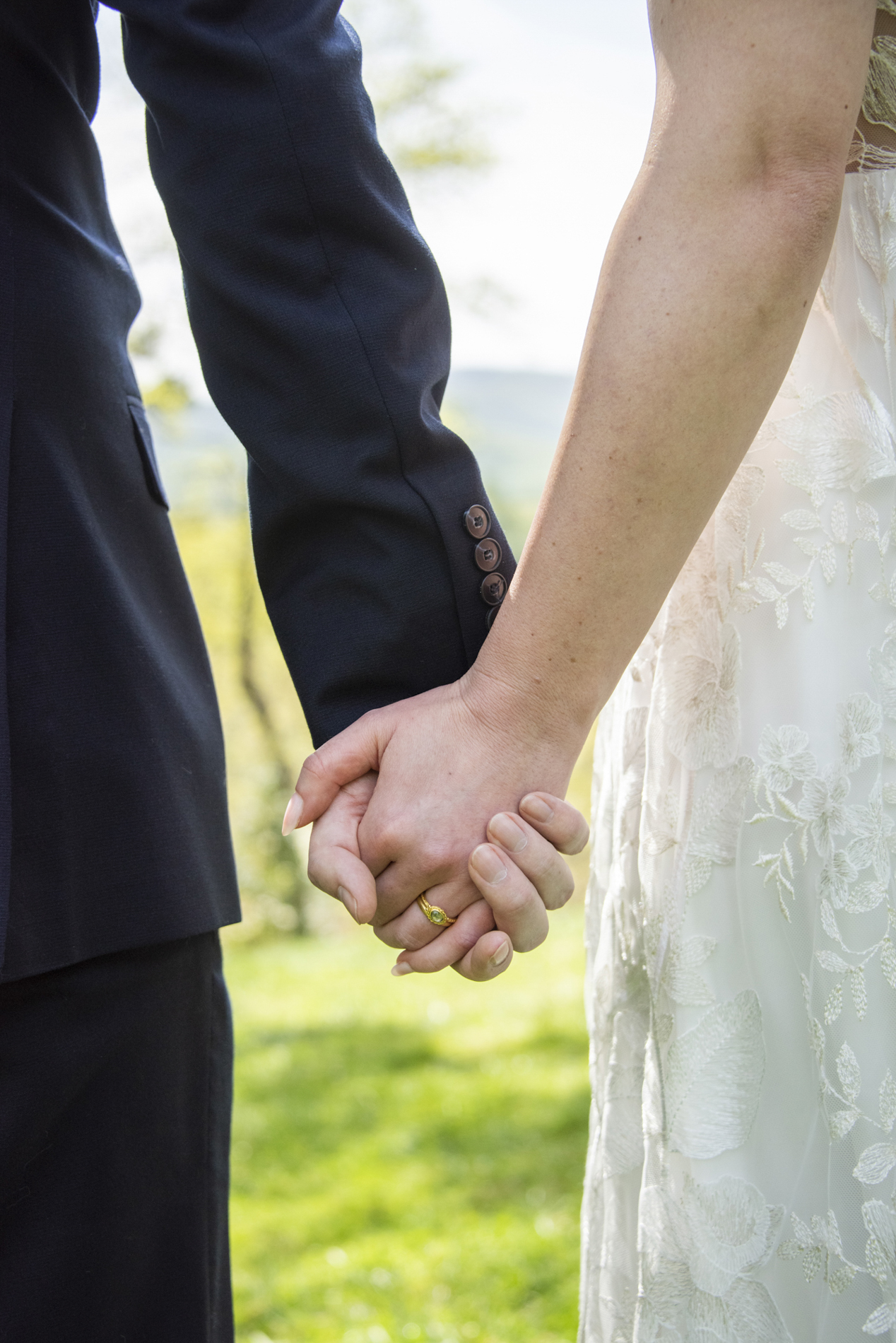 Hands with wedding rings