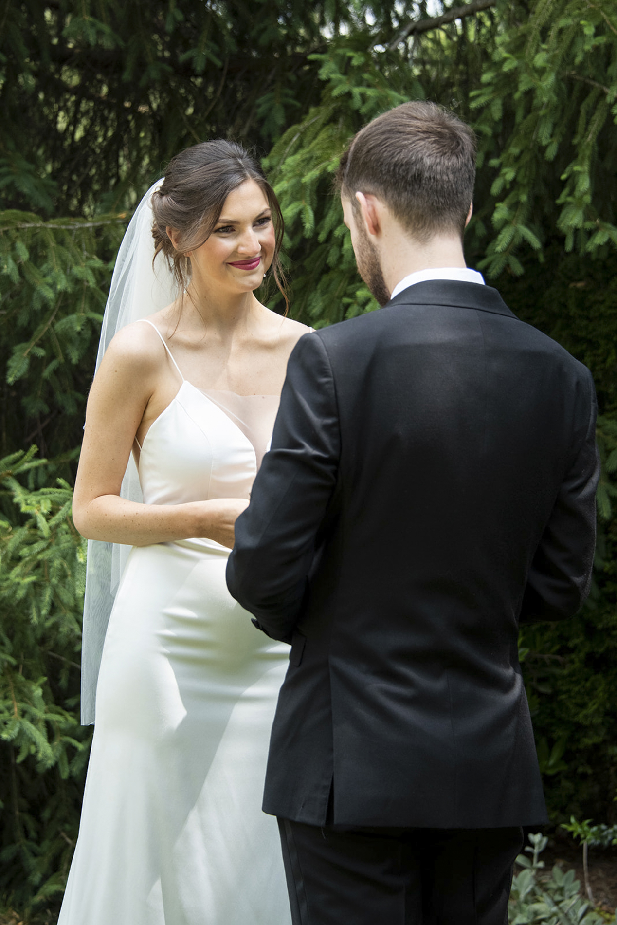 Bride looking at groom during private vows