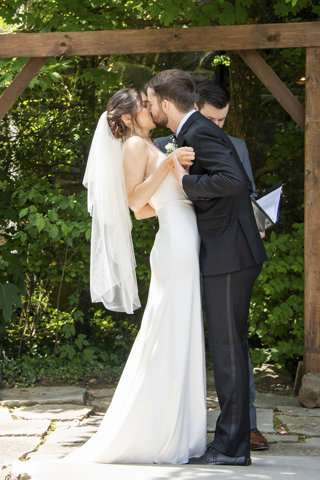 couples first kiss at Homewood Asheville wedding