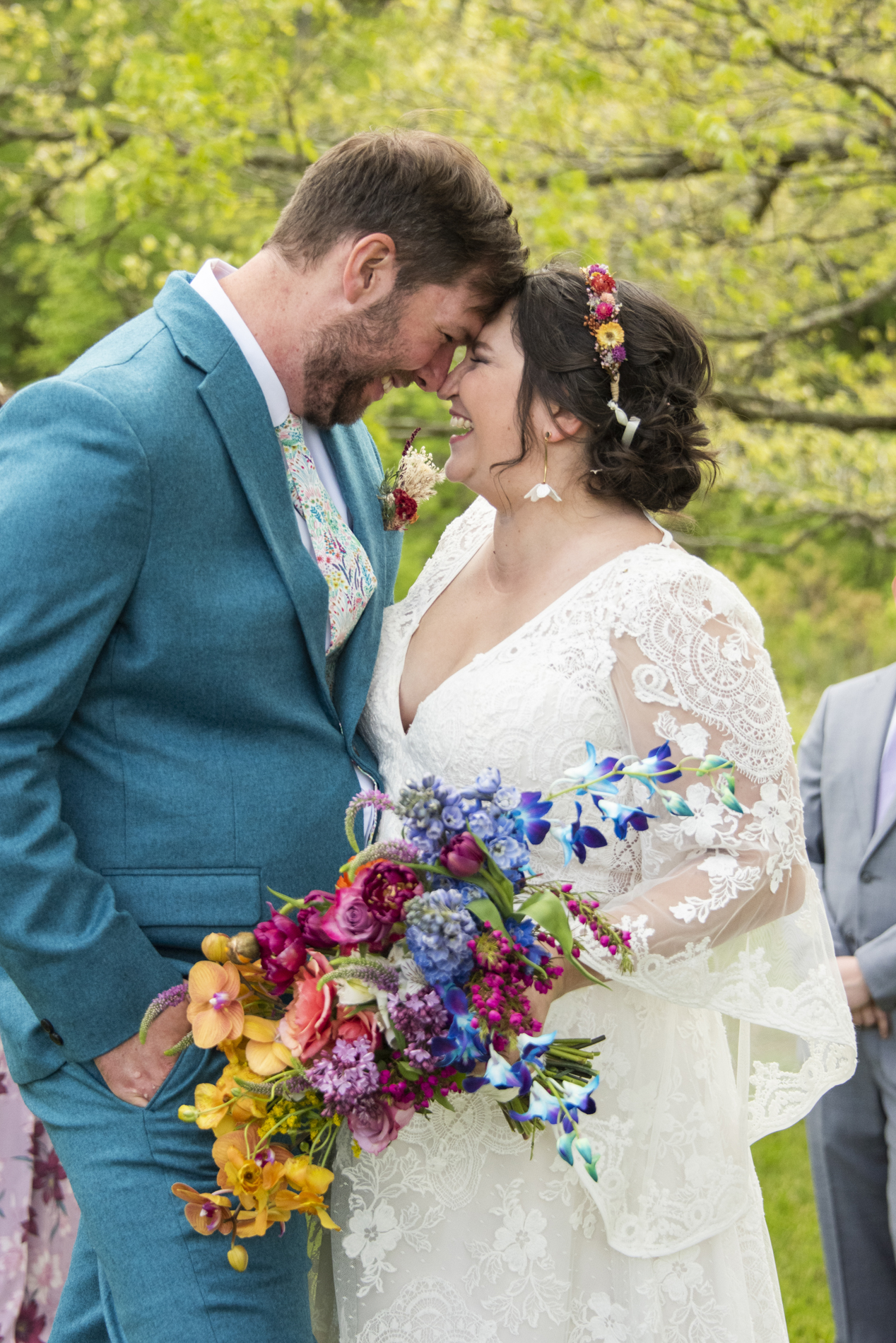 wedding couple laughing at Emerald Ridge Farm