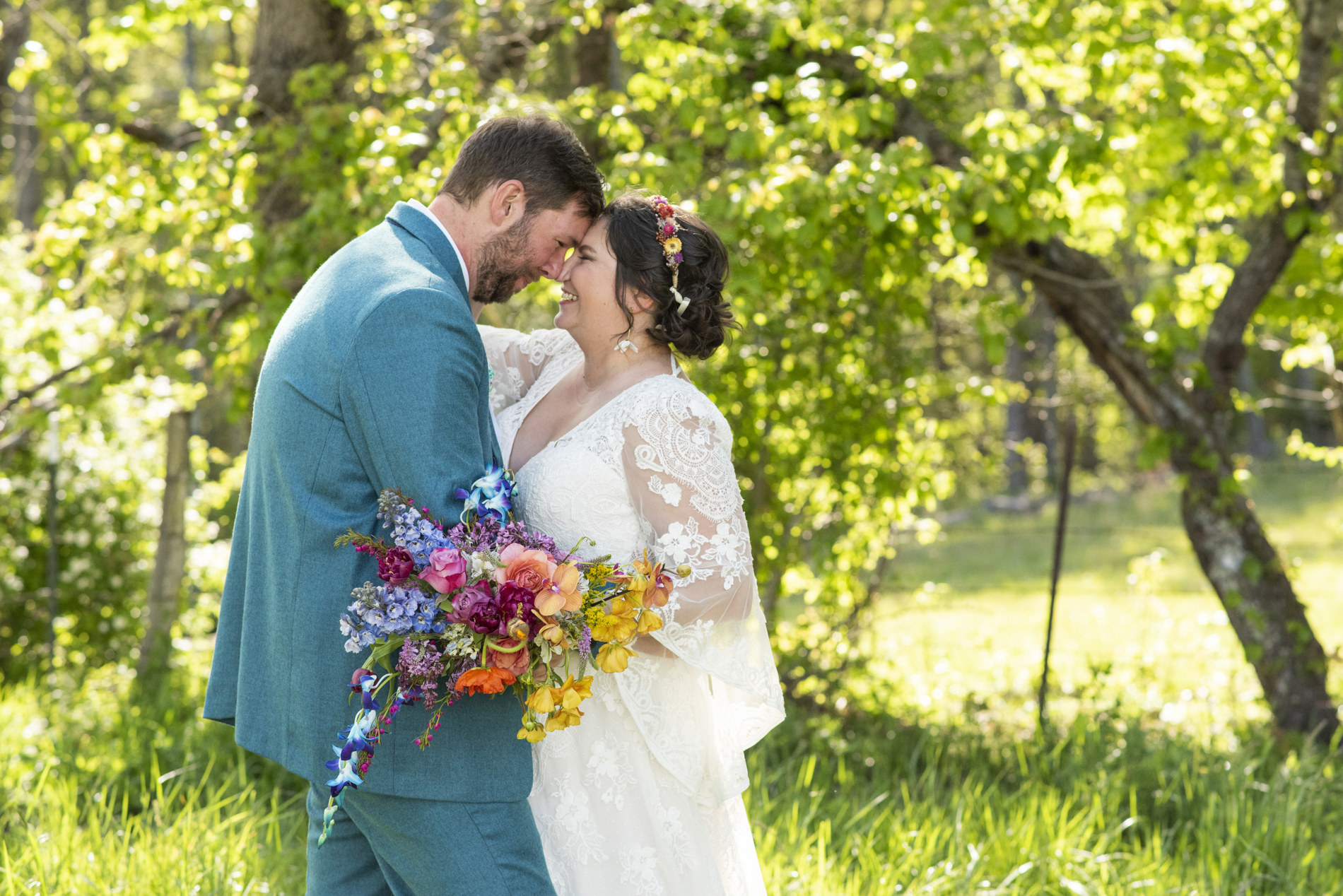 wedding couple laughing at Emerald Ridge Farm